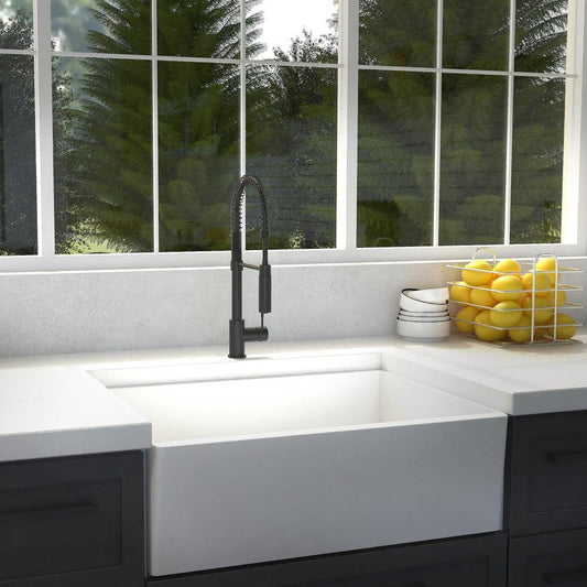 ZLINE Sierra Pull Down Spring Single Handle Kitchen Faucet in Matte Black (SRA-KF-MB) in a cottage-style kitchen.