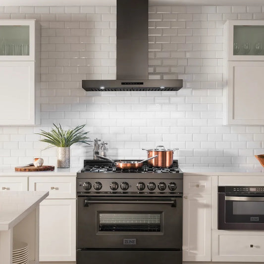 Farmhouse kitchen with ZLINE 36 in. Convertible Vent Wall Mount Range Hood in Black Stainless Steel (BSKEN-36) and white tiled walls