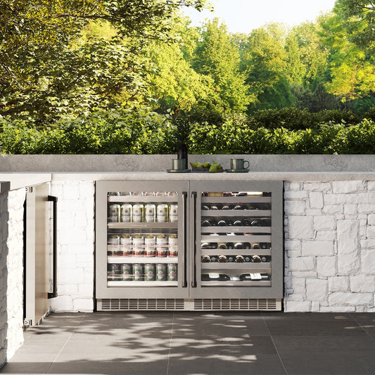 ZLINE Autograph Edition 24 in. Touchstone 151 Can Beverage Fridge With Satin Stainless Steel Glass Door And Matte Black Handle (RBSOZ-SN-24-MB) front, in a luxury outdoor kitchen.
