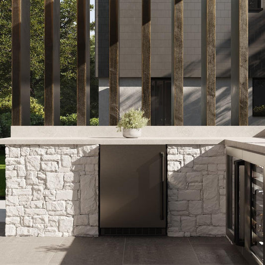 ZLINE Autograph Edition 24 in. Touchstone 151 Can Beverage Fridge With Solid Stainless Steel Door And Matte Black Handle (RBSOZ-ST-24-MB) front, in a luxury outdoor kitchen.