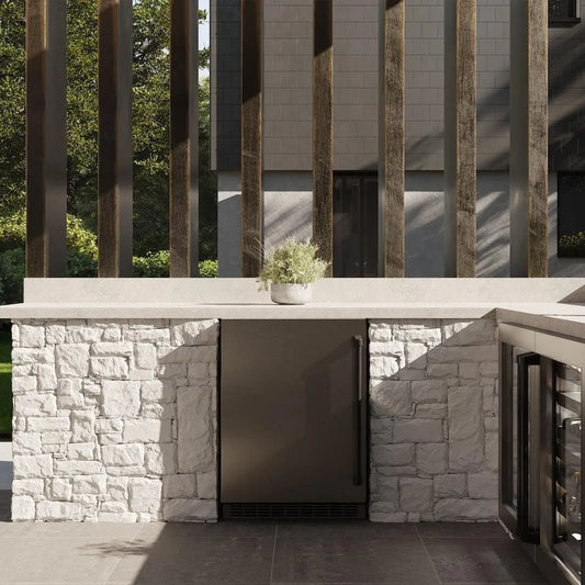 ZLINE Autograph Edition 24 in. Touchstone 151 Can Beverage Fridge With Solid Stainless Steel Door And Matte Black Handle (RBSOZ-ST-24-MB) front, in a luxury outdoor kitchen.