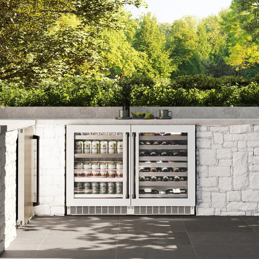 ZLINE Autograph Edition 24 in. Touchstone 151 Can Beverage Fridge With White Matte Glass Door And Matte Black Handle (RBSOZ-WM-24-MB) front, in a luxury outdoor kitchen.
