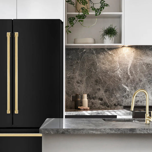 Modern kitchen with ZLINE Autograph Edition 36 in. 22.5 cu. ft. Counter-Depth French Door Refrigerator with Ice Maker in Fingerprint-Resistant Black Stainless Steel with Polished Gold Traditional Handles (RFMZ-36-BS-G), marble backsplash, and gold faucet.