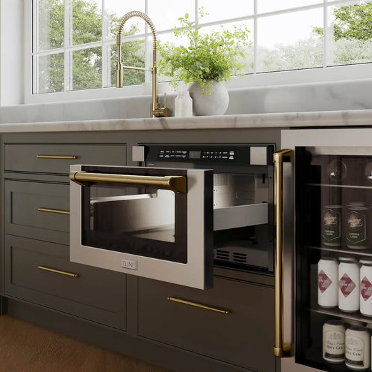 ZLINE Autograph Edition 24 in. 1.2 cu. ft. Built-in Microwave Drawer with a Traditional Handle in Stainless Steel and Champagne Bronze Accents (MWDZ-1-H-CB) in a luxury kitchen with blue cabinets.