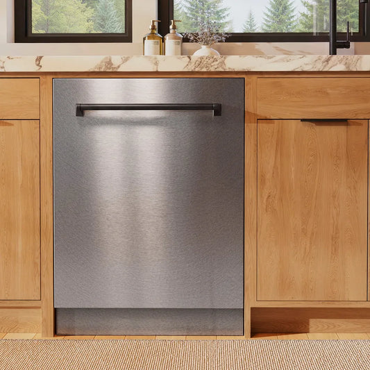 ZLINE Autograph Edition 24 in. Monument Series 3rd Rack Dishwasher with Auto Door Open Drying, 44dBa, Satin Stainless Steel Panel with Matte Black Handle (DWMTZ-SN-24-MB) front, in a kitchen with wooden cabinets and a window view.