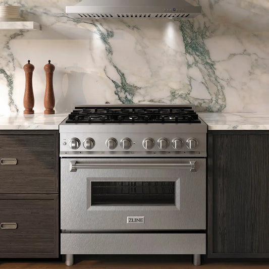 ZLINE 36 in. 4.6 cu. ft. Legacy Dual Fuel Range with 6 Burner Gas Cooktop and Electric Convection Oven in Stainless Steel with Satin Stainless Steel Door (RA-SN-36) in a kitchen with marble backsplash and wooden cabinets