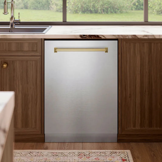 ZLINE Autograph Edition 24 in. Tallac Series 3rd Rack Dishwasher with Auto Door Open Drying, 51dBa, Stainless Steel Panel with Champagne Bronze Handle (DWVZ-304-24-CB) in a kitchen with wooden cabinets and a window view.