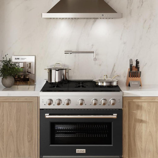 ZLINE 36 in. 5.2 cu. ft. Paramount Gas Range with 6 Burner Cooktop and Convection Gas Oven in Stainless Steel with Black Matte Door (SGR-BLM-36) in a luxury kitchen, front.