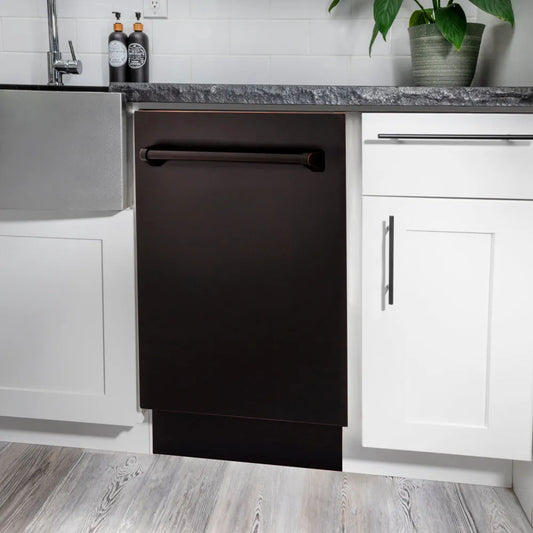 ZLINE 18 in. Tallac Series 3rd Rack Dishwasher with Auto Door Open Drying, 51dBa, Oil-Rubbed Bronze Panel (DWV-ORB-18) in a modern kitchen with white cabinets and a gray countertop.