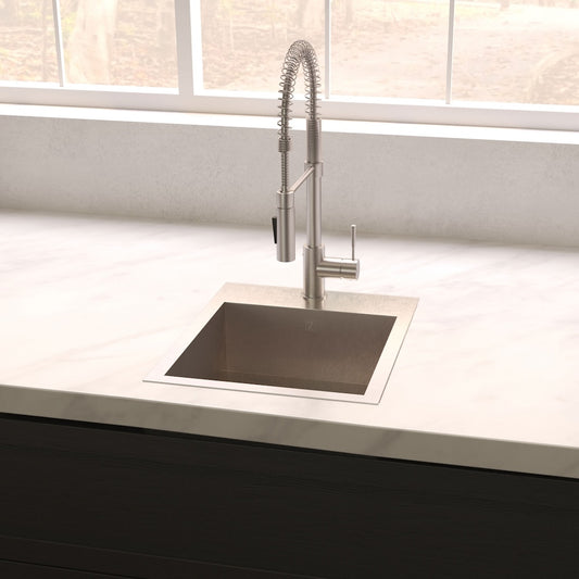 ZLINE 15 in. Donner Topmount Single Bowl Satin Stainless Steel Bar Kitchen Sink (STS-15S) with faucet on a light-colored countertop