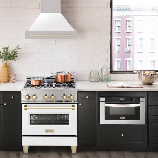 ZLINE Autograph Edition 30 in. Satin Stainless Steel Wall Mount Range Hood with White Matte Shell and Polished Gold Handle (8654SNZ-WM30-G) in a luxury kitchen.