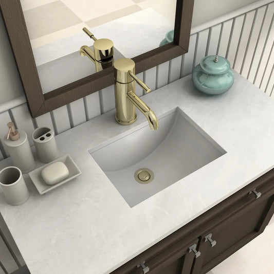 ZLINE Autograph Edition Aloha Single Handle Bath Faucet in Polished Gold (ALH-BF-PG) on a bathroom vanity with mirror and toiletries.