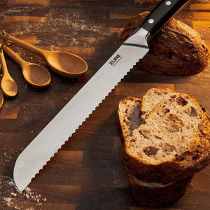 ZLINE Bread Knife on Wood Cutting Board with Freshly Baked Bread