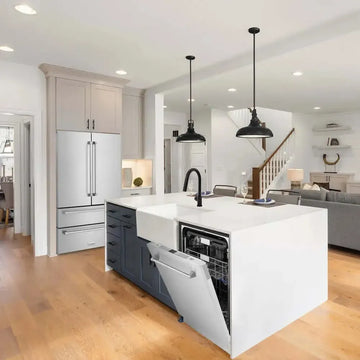 Stainless steel ZLINE Monument dishwasher open in a modern kitchen island with dark blue cabinets and white countertops.