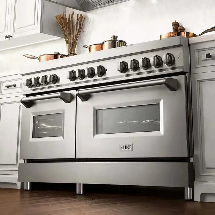 Stainless steel ZLINE 60-inch dual fuel range with double ovens and professional knobs in a modern kitchen.
