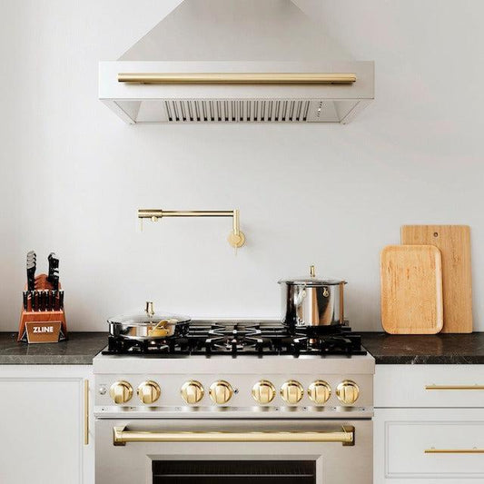 ZLINE Autograph Edition Range Hood above a matching range in a kitchen.