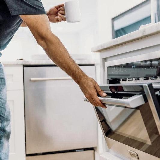 Person using a ZLINE Microwave Oven