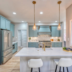 Luxury kitchen with blue cabinets, white countertops, and ZLINE 48 in. 6.0 cu. ft. Legacy Dual Fuel Range with 7 Burner Gas Cooktop and 2 Electric Ovens in Stainless Steel (RA48).