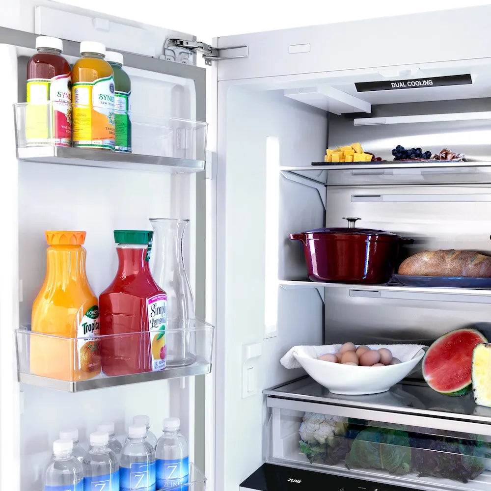 ZLINE 36 in. 19.6 cu. ft. Panel Ready French Door Built-In Bottom Freezer Refrigerator with Water Dispenser and Ice Maker (RBIV-36) door storage with various food items and drinks inside.