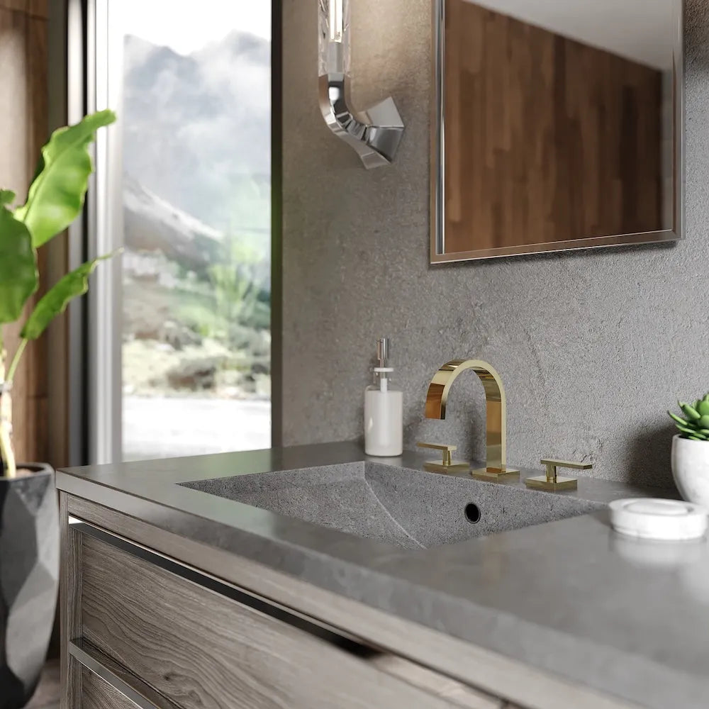 ZLINE Autograph Edition Bliss Widespread Bath Faucet in Polished Gold (BLS-BF-PG) on a bathroom vanity with a sink and decorative elements.
