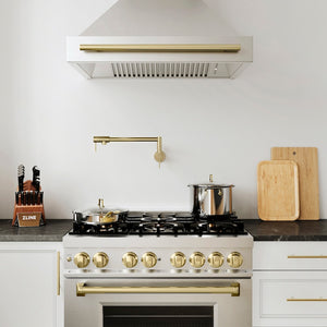 ZLINE Gemini Pot Filler in Champagne Bronze (GEM-FPF-CB) above a stainless steel range with bronze accents in a modern kitchen setting, front.