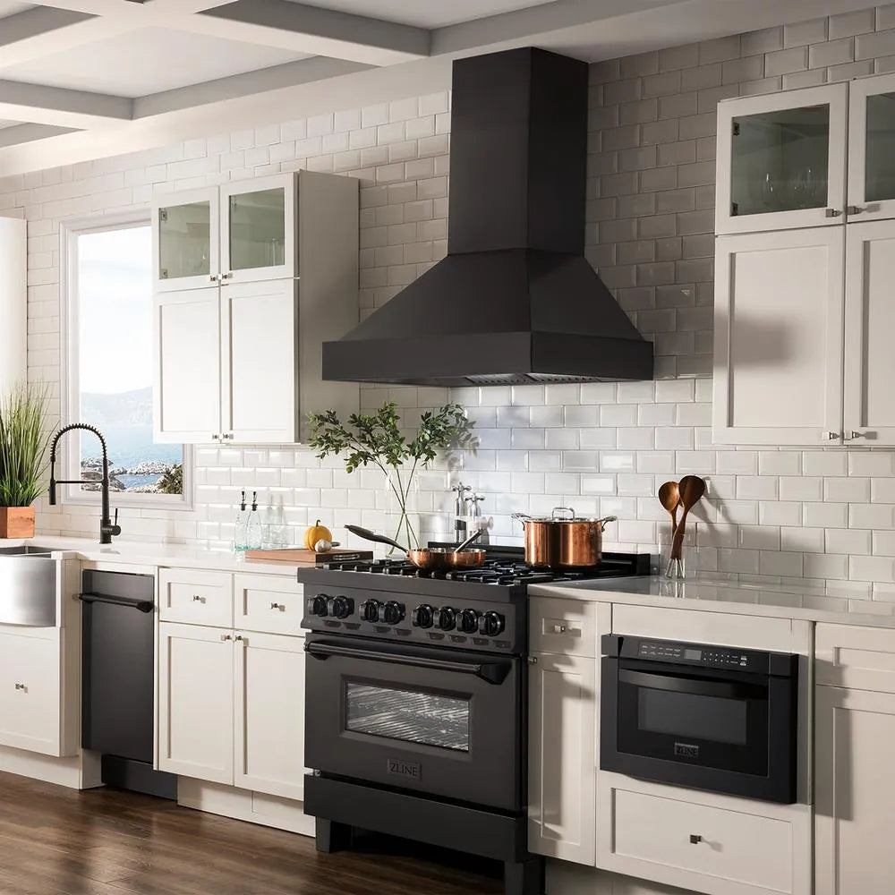 ZLINE 36 in. Ducted Vent Black Stainless Steel Wall Mount Range Hood (BS655N-36) in a kitchen with a black range, white cabinets, and tiled walls.