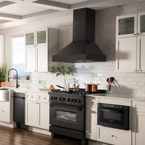 ZLINE 36 in. Ducted Vent Black Stainless Steel Wall Mount Range Hood (BS655N-36) in a kitchen with a black range, white cabinets, and tiled walls.