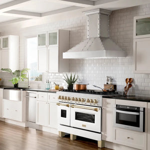 Farmhouse kitchen with ZLINE Autograph Edition 48 in. 6.0 cu. ft. Legacy Dual Fuel Range with 7 Burner Gas Cooktop and 2 Electric Ovens in Satin Stainless Steel with White Matte Doors and Polished Gold Accents (RASZ-WM-48-G), white cabinets, stainless steel appliances, and a white tiled backsplash.