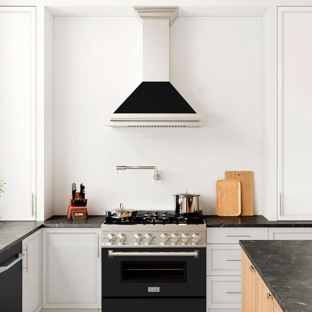 ZLINE Convertible Stainless Steel Range Hood with Black Matte Shell and Stainless Steel Handle (KB4STX-BLM) in a luxury kitchen with matching range and microwave.