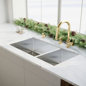 ZLINE Faucet Soap Dispenser in Polished Gold (FSD-PG) with matching faucet and drink faucet.