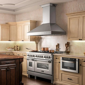 Designer kitchen with stainless steel range and ZLINE 48 in. CrownSound™ Ducted Vent Wall Mount Range Hood in Stainless Steel with Built-in Bluetooth Speakers (667CRN-BT-48), wooden cabinets, and decorative elements.