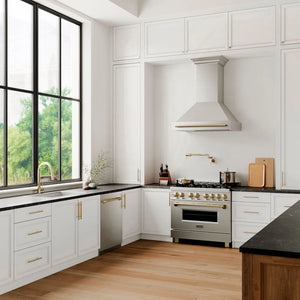 Modern farmhouse kitchen with ZLINE Autograph Edition 24 in. Tallac Series 3rd Rack Top Control Built-In Tall Tub Dishwasher in Stainless Steel with Polished Gold Handle, 51dBa (DWVZ-304-24-G), white cabinets, stainless steel appliances, and a large window.