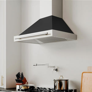 ZLINE Convertible Stainless Steel Range Hood with Black Matte Shell and Stainless Steel Handle (KB4STX-BLM) in a luxury kitchen with matching range and microwave.