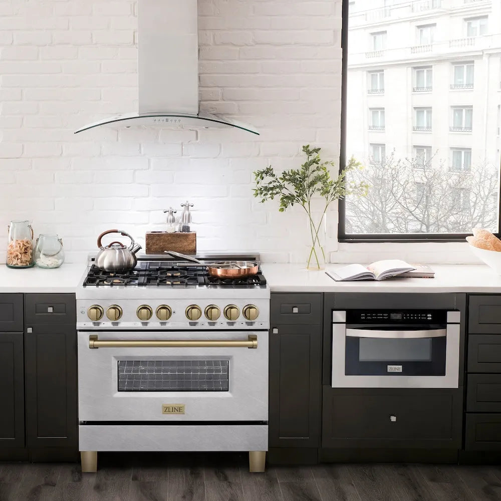 Modern kitchen with a ZLINE Autograph Edition 36 in. 4.6 cu. ft. Legacy Dual Fuel Range with 6 Burner Gas Cooktop and Electric Convection Oven in Satin Stainless Steel and Champagne Bronze Accents (RASZ-SN-36-CB) and black cabinets