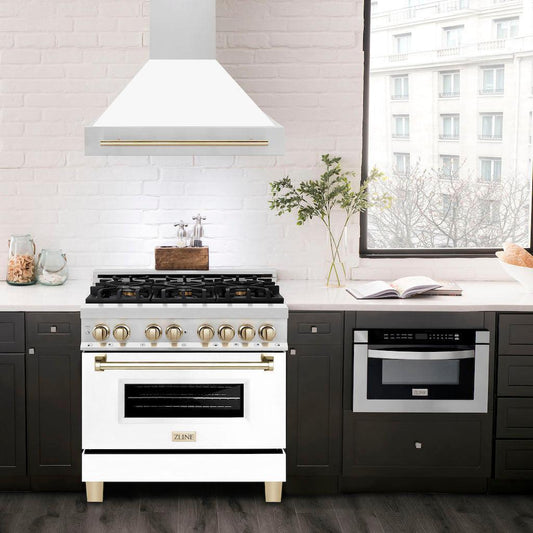 ZLINE Autograph Edition 36 in. Stainless Steel Range Hood with White Matte Shell and Accents (8654STZ-WM36) in a luxury compact kitchen with matching range and microwave, front.