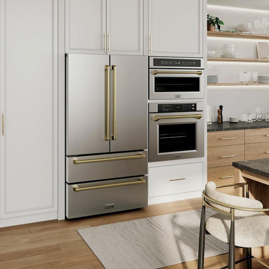 ZLINE Autograph Edition 36 in. 22.5 cu. ft Freestanding French Door Refrigerator with Ice Maker in Fingerprint Resistant Stainless Steel with Champagne Bronze Accents (RFMZ-36-CB) in a farmhouse-style kitchen with matching built-in microwave and wall oven, front.