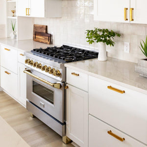 ZLINE Autograph Edition 36 in. 4.6 cu. ft. Dual Fuel Range with Gas Stove and Electric Oven in Stainless Steel with Polished Gold Accents (RAZ-36-G) in a white cottage-style kitchen, side.