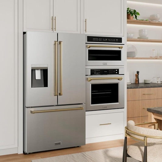 ZLINE Autograph Edition 36 in. 28.9 cu. ft. Standard-Depth French Door External Water Dispenser Refrigerator with Dual Ice Maker in Fingerprint Resistant Stainless Steel and Champagne Bronze Handles (RSMZ-W-36-CB) next to matching microwave and wall oven in a farmhouse-style kitchen.