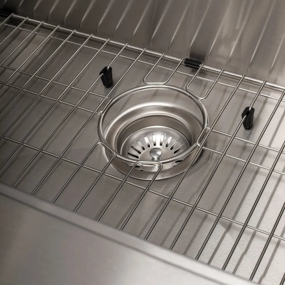 ZLINE Moritz 33 in. Farmhouse Apron Mount Single Bowl Stainless Steel Kitchen Sink with Bottom Grid and Accessories (SLSAP-33) basket strainer and utility rack.