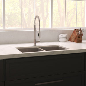 ZLINE Anton 33 in. Undermount Double Bowl Scratch Resistant Stainless Steel Kitchen Sink with Bottom Grid (SR50D-33S) in a farmhouse-style kitchen, above.