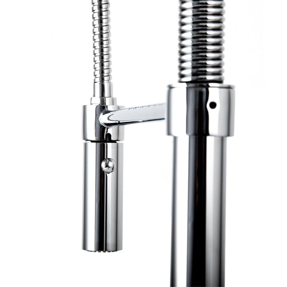 ZLINE Sierra Kitchen Faucet in Chrome (SRA-KF-CH) behind pull down spray wand.