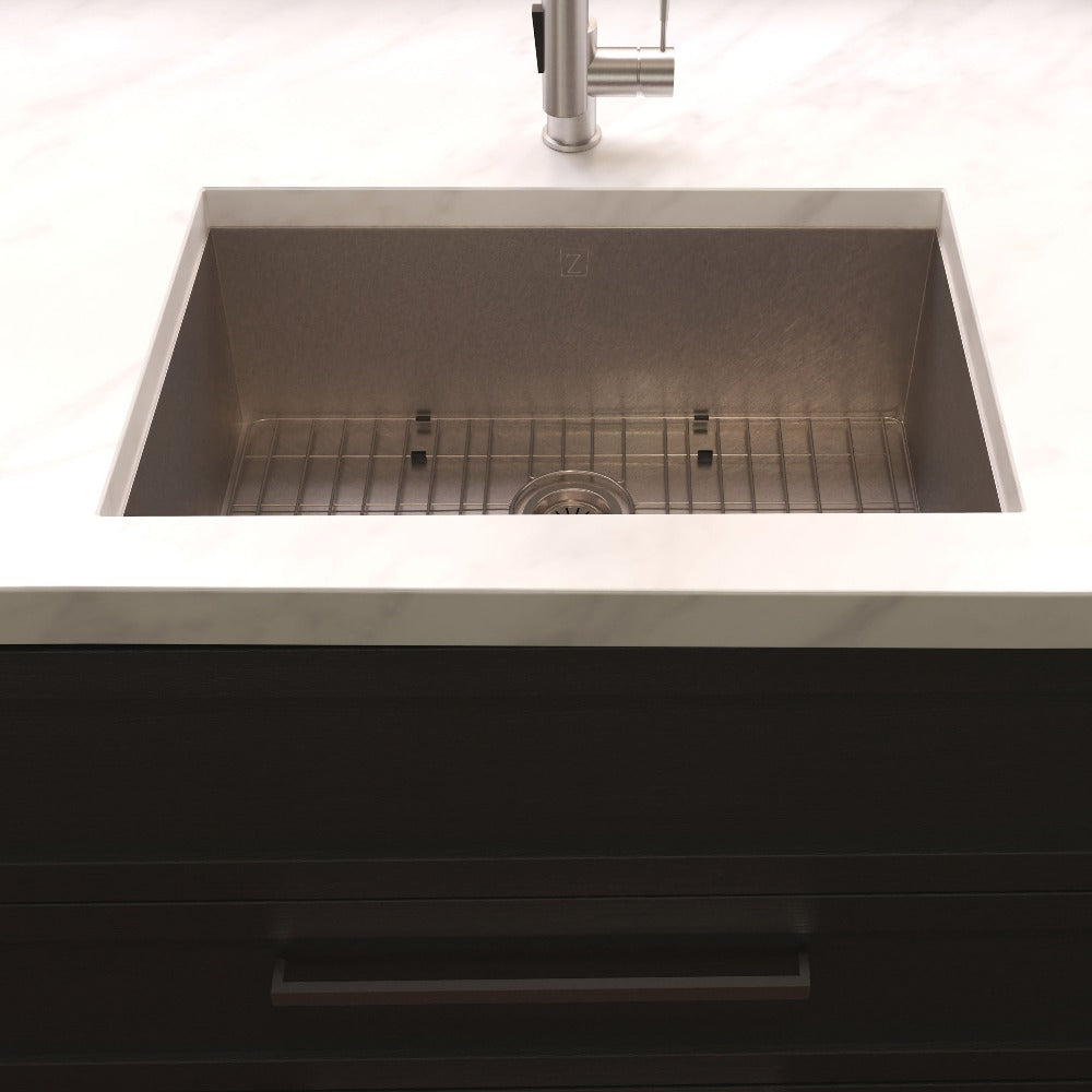 ZLINE Meribel 23 in. Undermount Single Bowl Scratch Resistant Stainless Steel Kitchen Sink with Bottom Grid (SRS-23S) in a farmhouse-style kitchen, front.