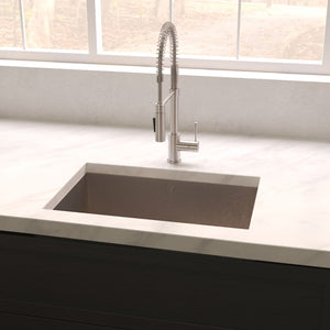 ZLINE Meribel 23 in. Undermount Single Bowl Scratch Resistant Stainless Steel Kitchen Sink with Bottom Grid (SRS-23S) in a farmhouse-style kitchen, above.