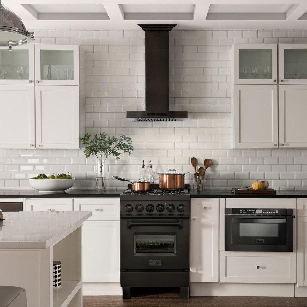 ZLINE Convertible Vent Wall Mount Range Hood in Black Stainless Steel with Crown Molding (BSKENCRN) in a white cottage kitchen above matching range.