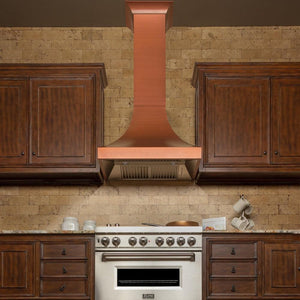 ZLINE Designer Series Copper Finish Wall Range Hood (8632C) in a rustic-style kitchen, front.