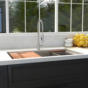 ZLINE Garmisch 27 in. Undermount Single Bowl Stainless Steel Kitchen Sink with Bottom Grid and Accessories (SLS-27) in a farmhouse-style kitchen, front.