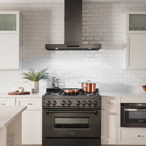 Farmhouse kitchen with ZLINE 36 in. Convertible Vent Wall Mount Range Hood in Black Stainless Steel (BSKEN-36) and white tiled walls