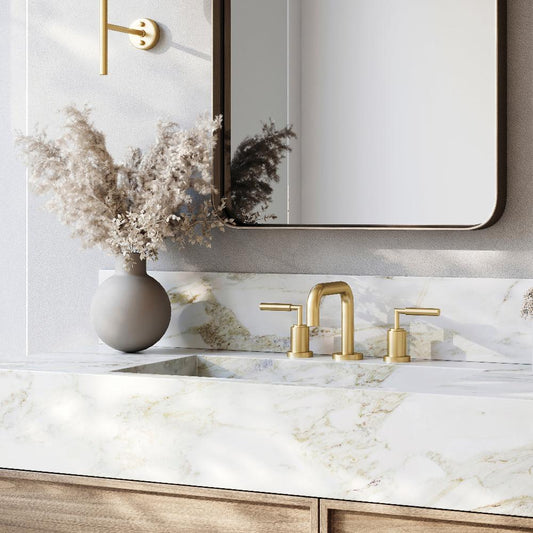 ZLINE El Dorado Widespread Bath Faucet in Polished Gold (ELD-BF-PG) in a luxury bathroom with marble vanity.