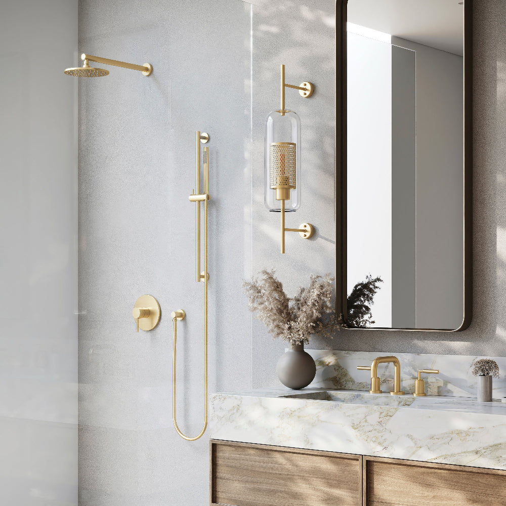 ZLINE El Dorado Widespread Bath Faucet in Polished Gold (ELD-BF-PG) in a modern bathroom with gold shower fixtures and marble countertop