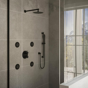 ZLINE Emerald Bay Thermostatic Shower System with Body Jets in Matte Black (EMBY-SHS-T3-MB) in a luxury bathroom.